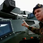 Belgický minister varuje pred hybridnými útokmi, zbrojenie zaostáva